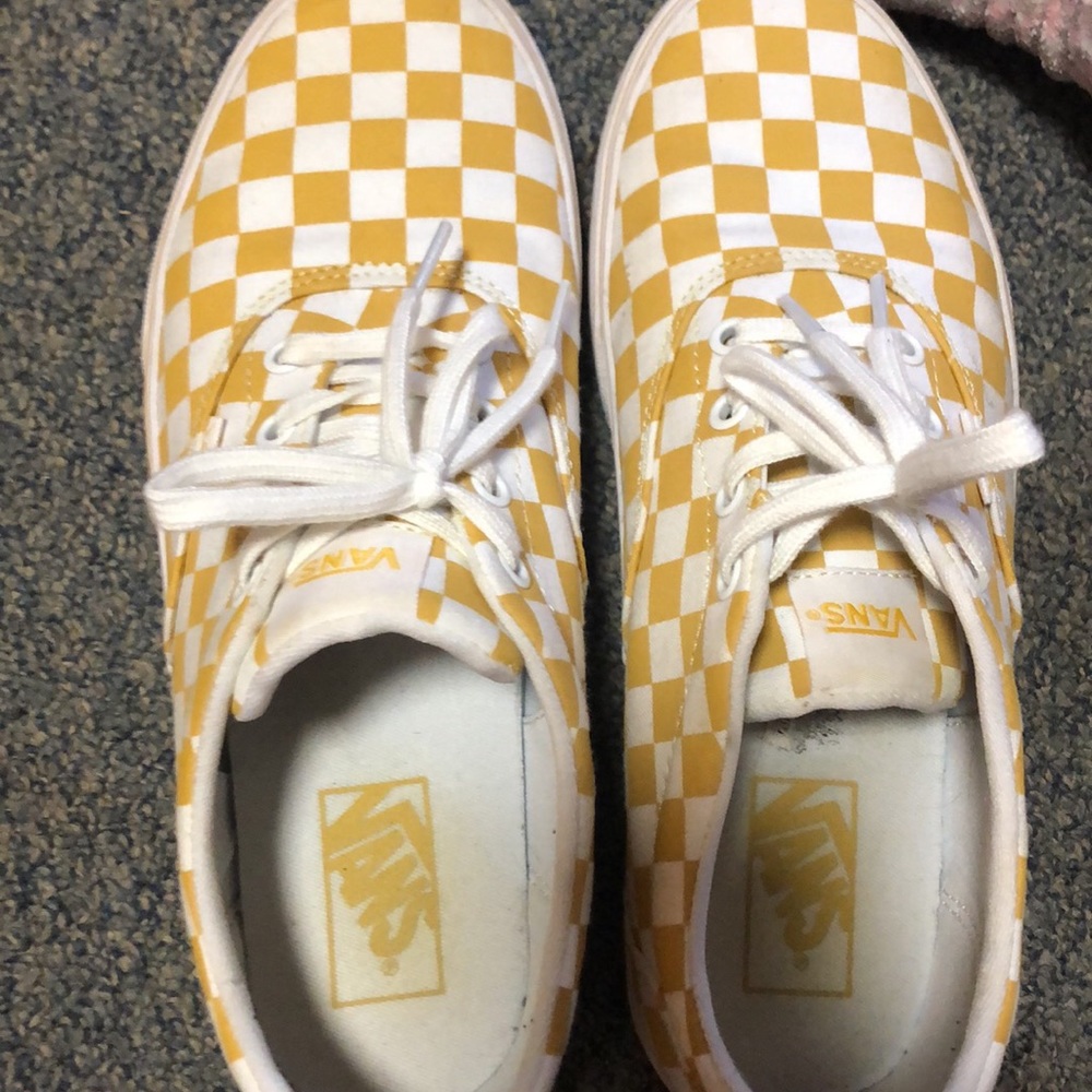 Yellow and white checkered Vans, women’s size 9.